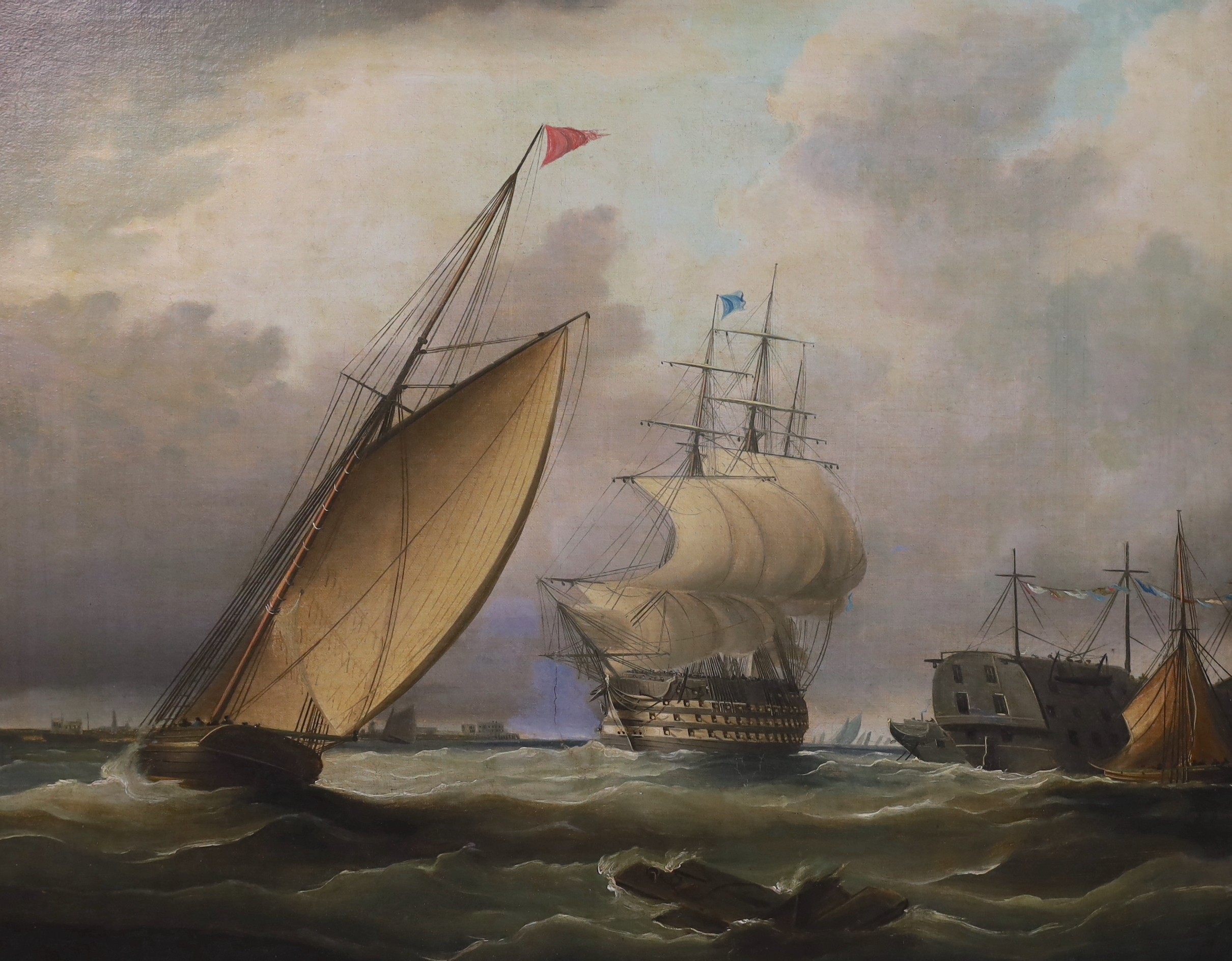 Follower of Charles Brooking (British, c.1723-1759), Shipping off the coast with a frigate flying a blue flag, hulks and other sailing ships, oil on canvas, 50 x 60cm